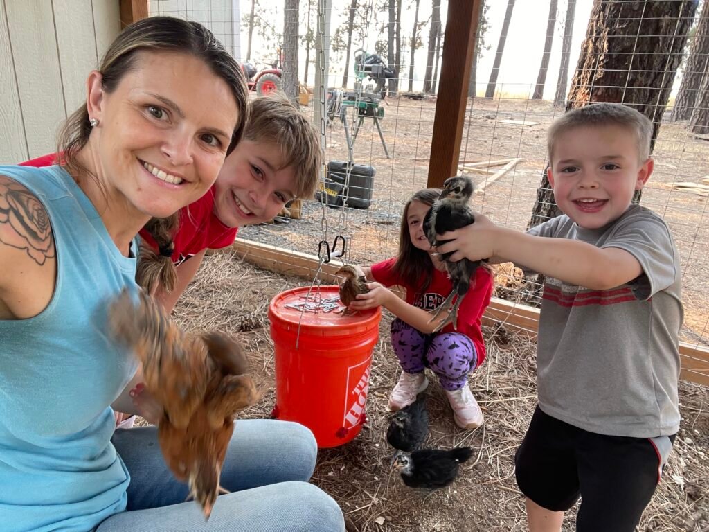 We pose with our chickens